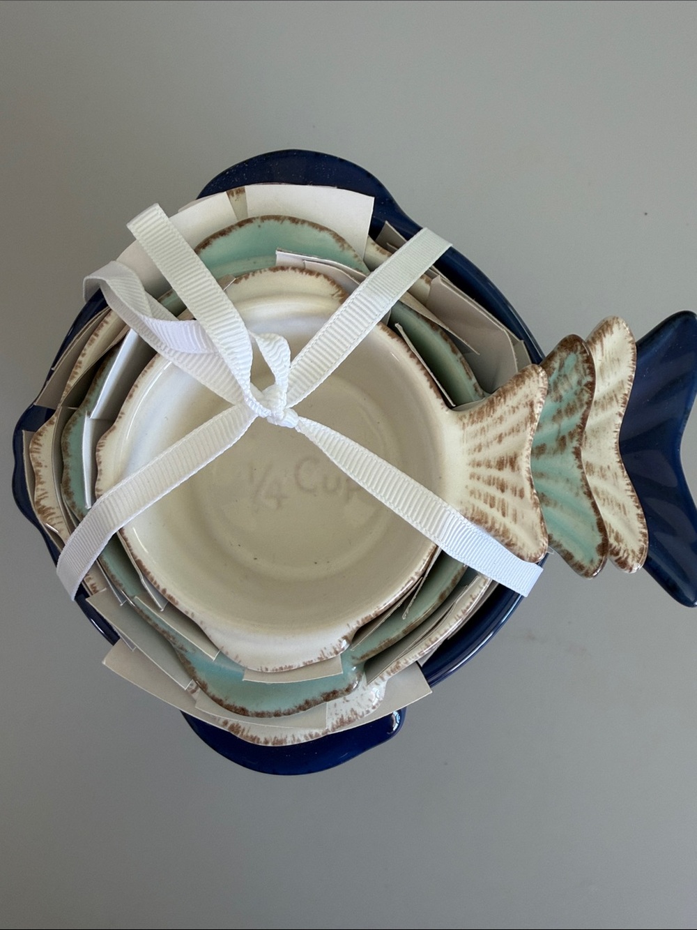 Cost Plus World Market Ceramic Fish Nesting Measuring Cups in Navy Blue and Aqua